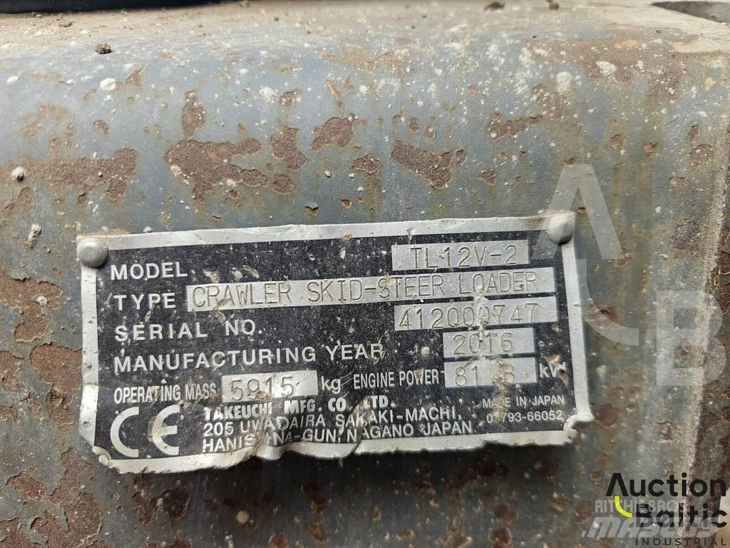 Takeuchi TL12V-2 لوادر زحافة