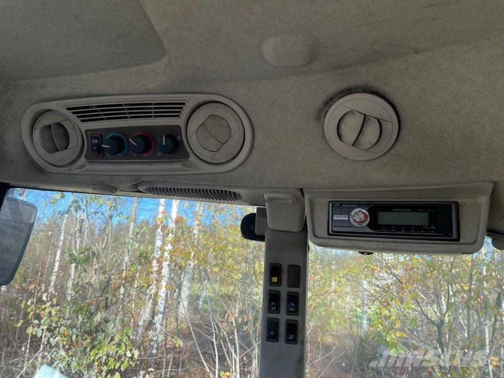 John Deere 5720 الجرارات