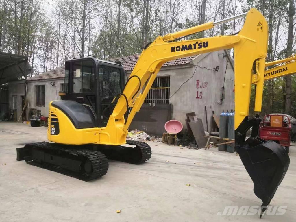 Komatsu PC 55 حفارات زحافة
