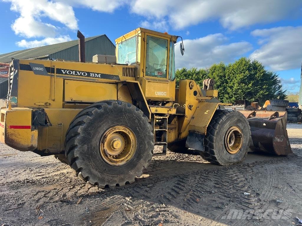 Volvo L180c لوادر بعجل