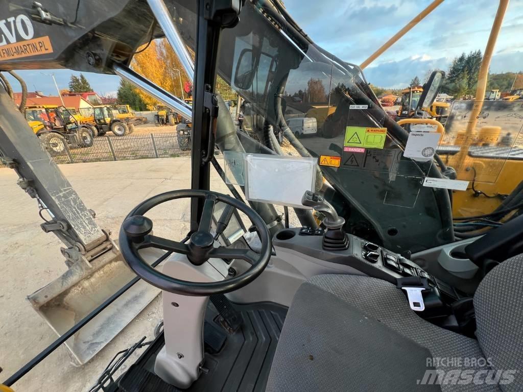 Volvo EW 140 C حفارات بعجل