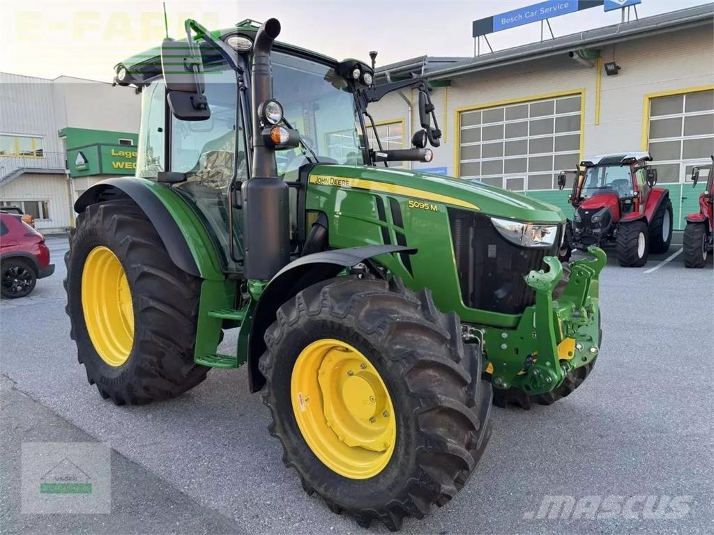 John Deere 5095 m الجرارات