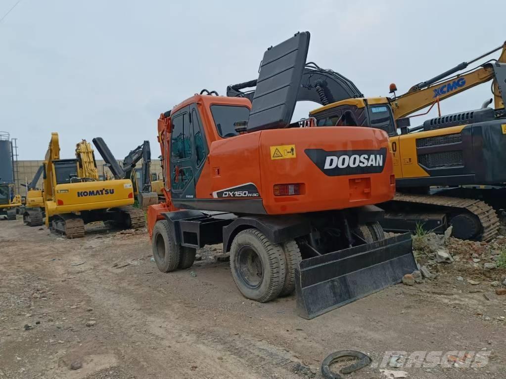Doosan 150 W-7 حفارات بعجل