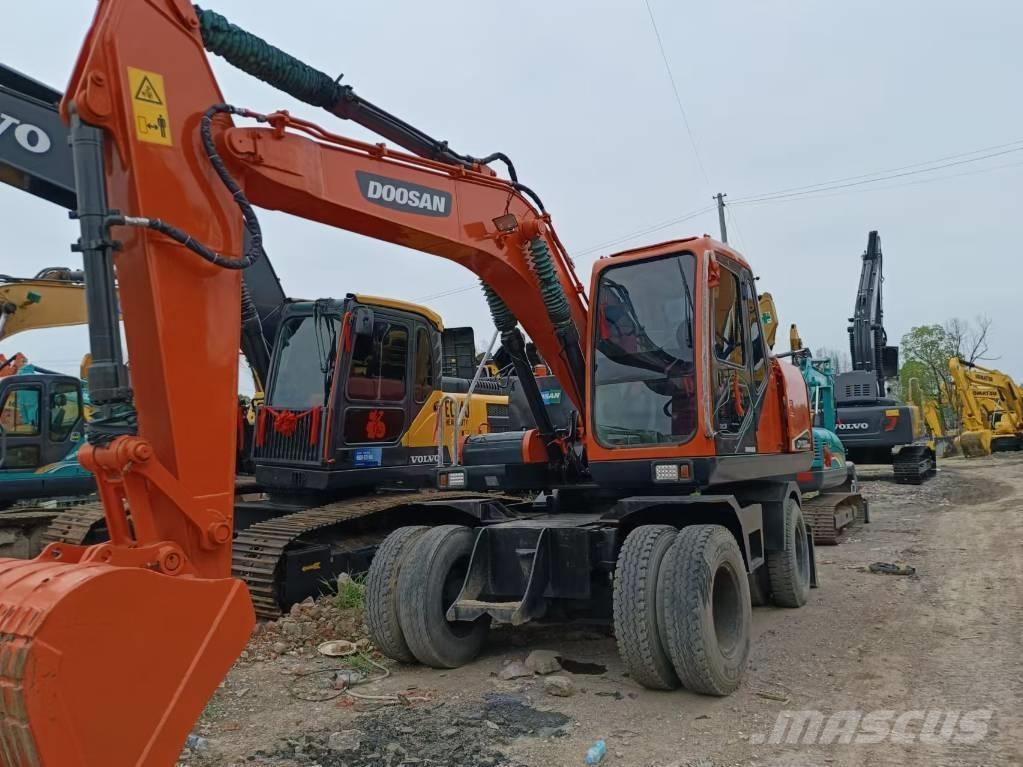 Doosan 150 W-7 حفارات بعجل