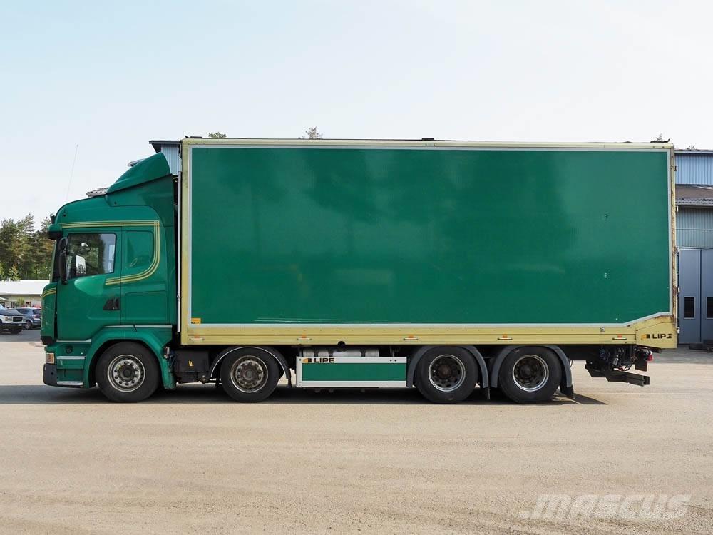 Scania R 730 شاحنات نقل ألواح الخشب