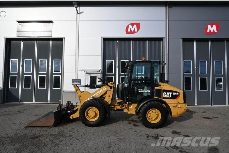CAT 906 H2 لوادر بعجل
