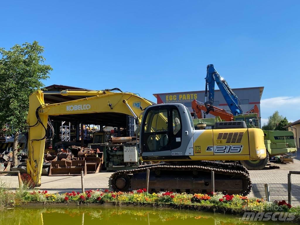 New Holland E 215 حفارات زحافة