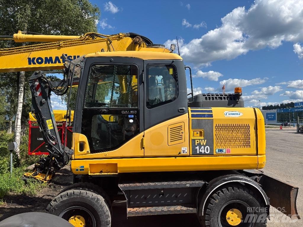Komatsu PW 140-7 حفارات بعجل