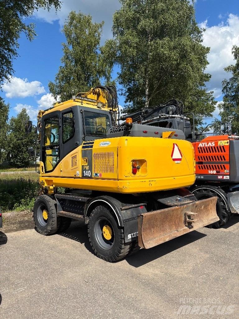 Komatsu PW 140-7 حفارات بعجل
