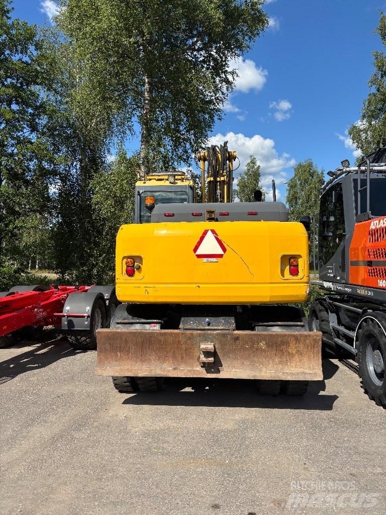 Komatsu PW 140-7 حفارات بعجل