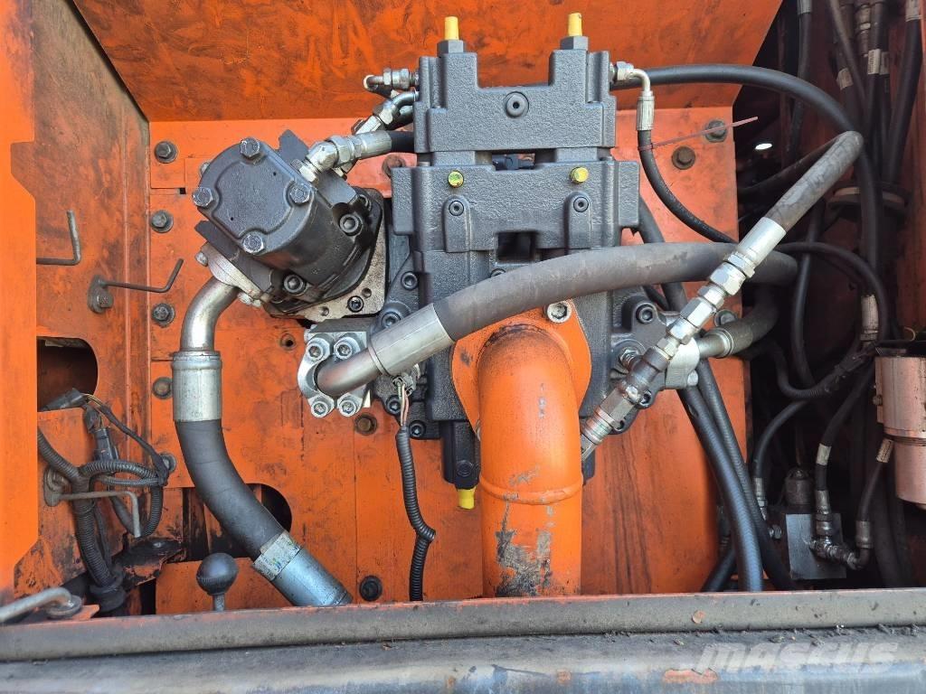 Doosan DX 210 W حفارات بعجل