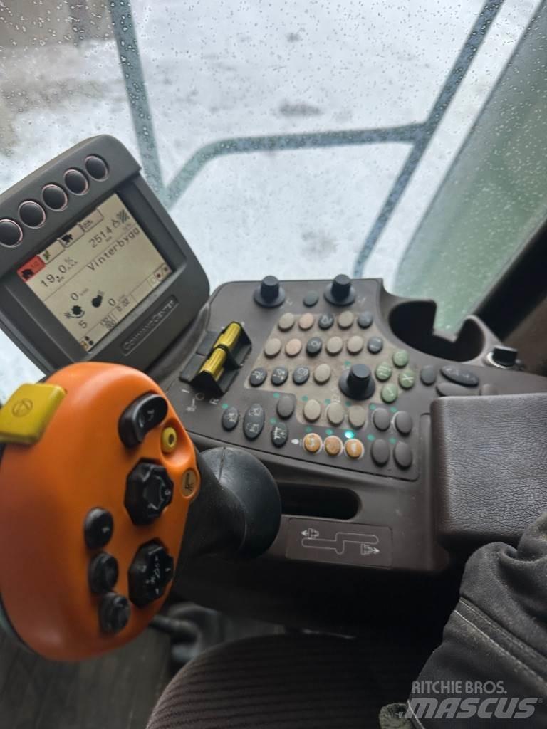 John Deere T550 حصادات