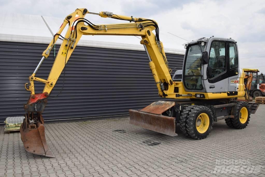 New Holland MH 2.6 حفارات بعجل