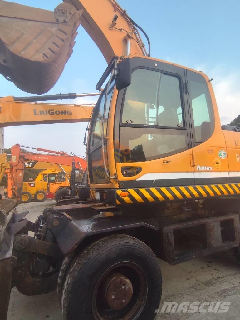 Hyundai R210W-9 حفارات بعجل