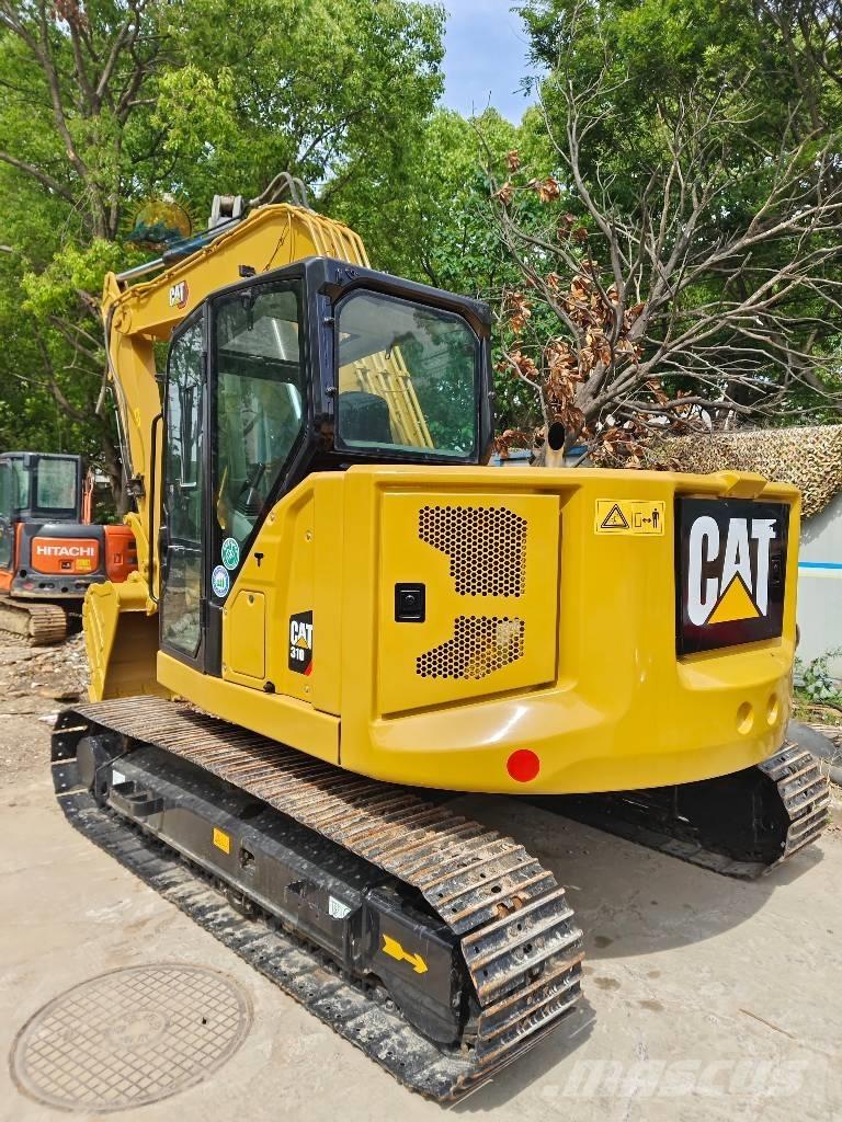CAT 310 حفارات زحافة