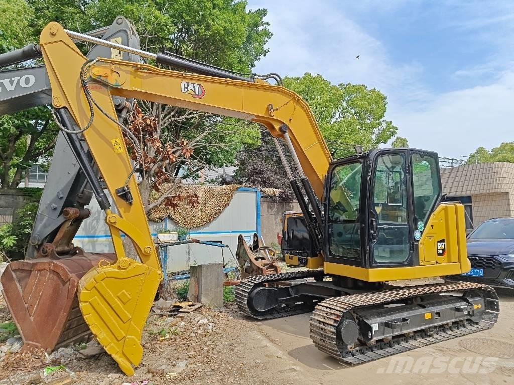 CAT 310 حفارات زحافة