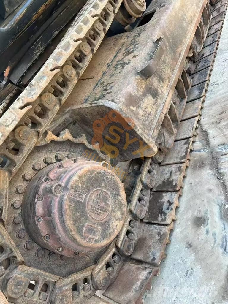 Hyundai Robex 520 VS حفارات زحافة