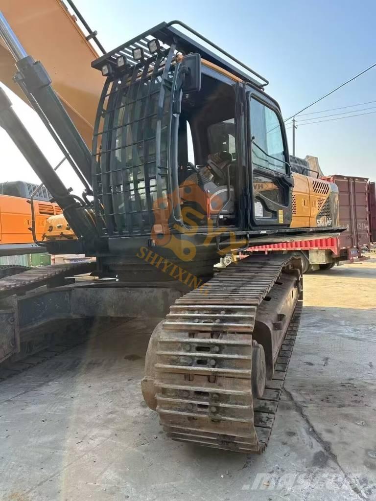 Hyundai Robex 520 VS حفارات زحافة