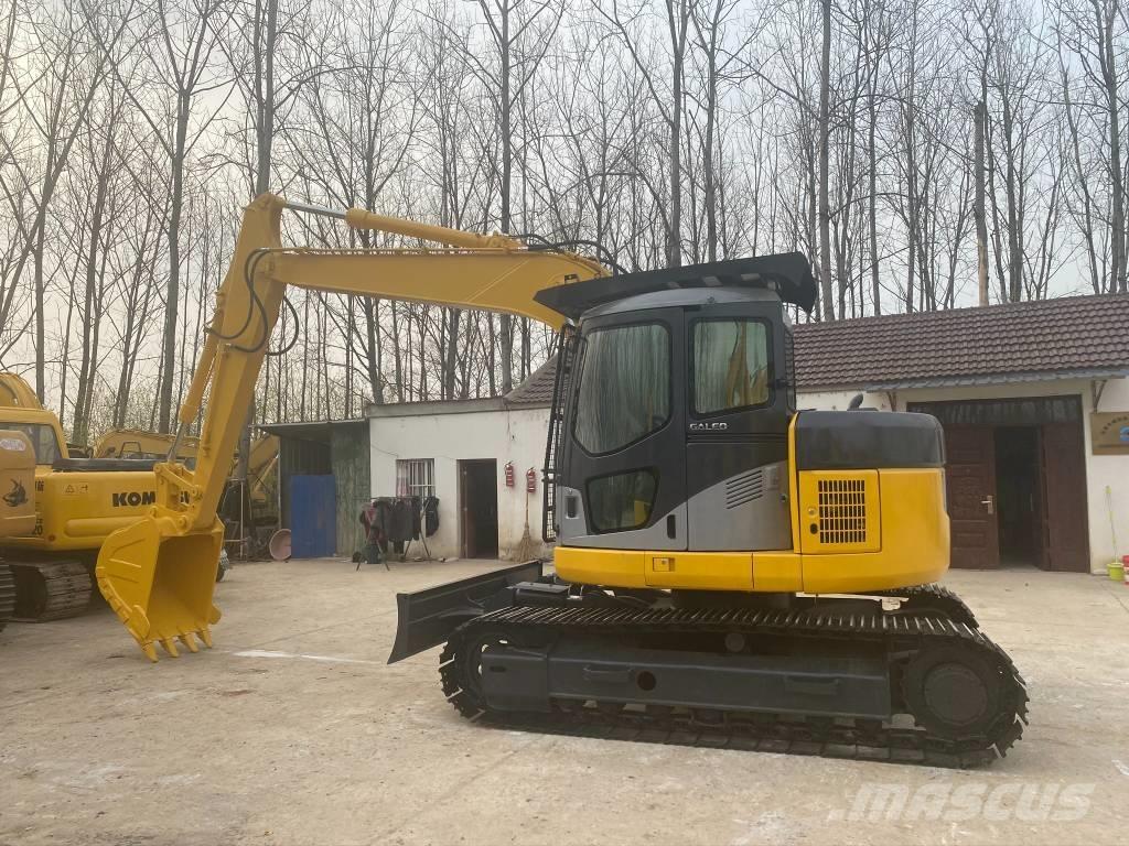 Komatsu PC128US حفارات زحافة