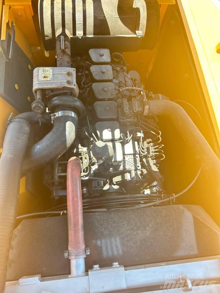 Hyundai 210w-9 حفارات بعجل