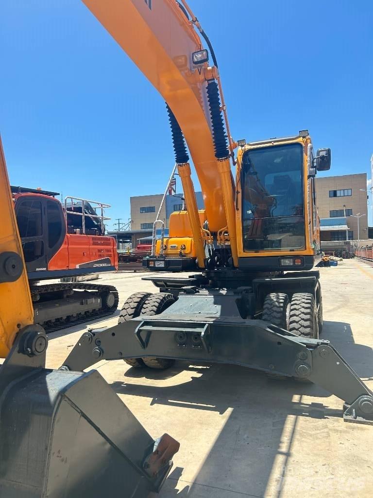 Hyundai 210w-9 حفارات بعجل