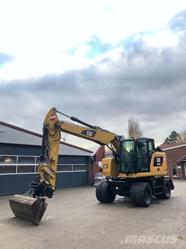 CAT M315F حفارات بعجل