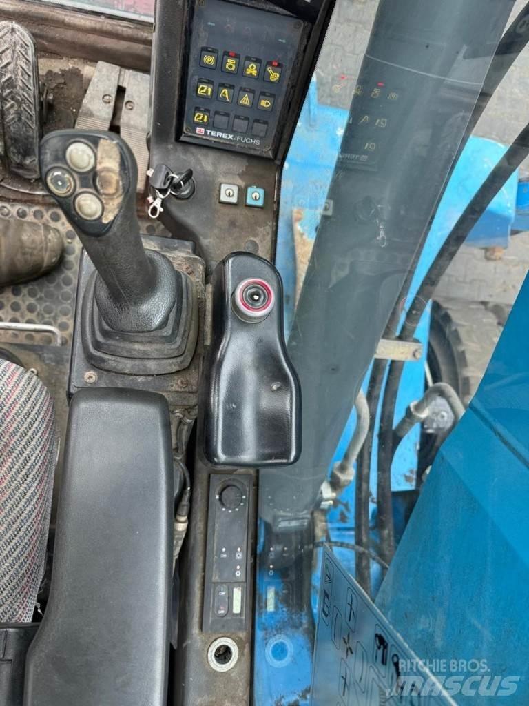 Fuchs MHL 320 مناولات المخلفات / مناولات صناعية