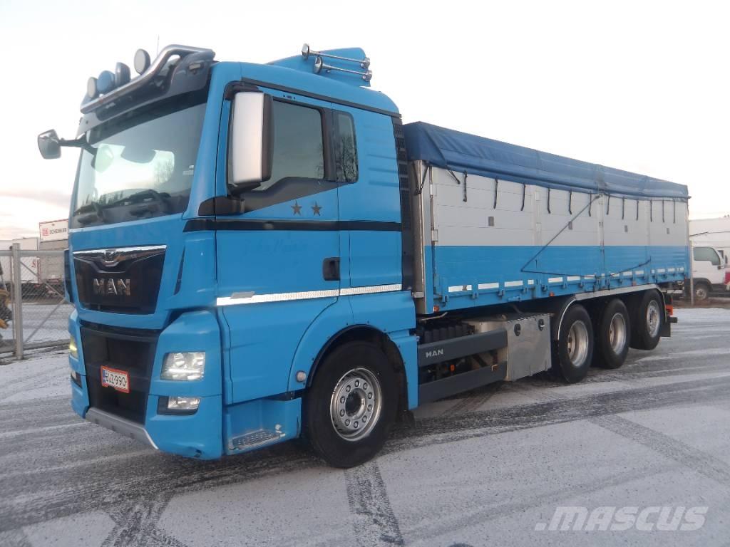 MAN TGX 35.560 8x4 شاحنات المزارع / الحبوب