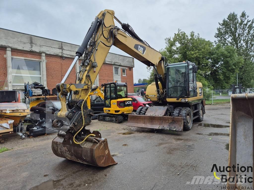 CAT M 315 D حفارات بعجل