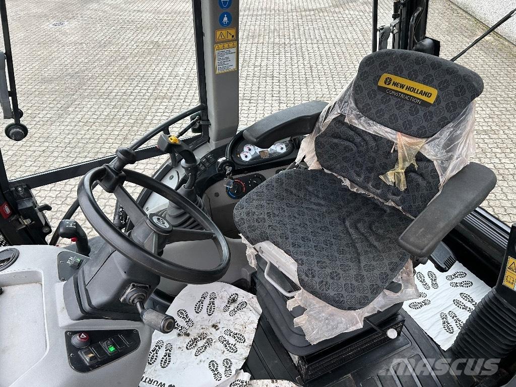 New Holland B 100 C لوادر ذات جرافات عكسية