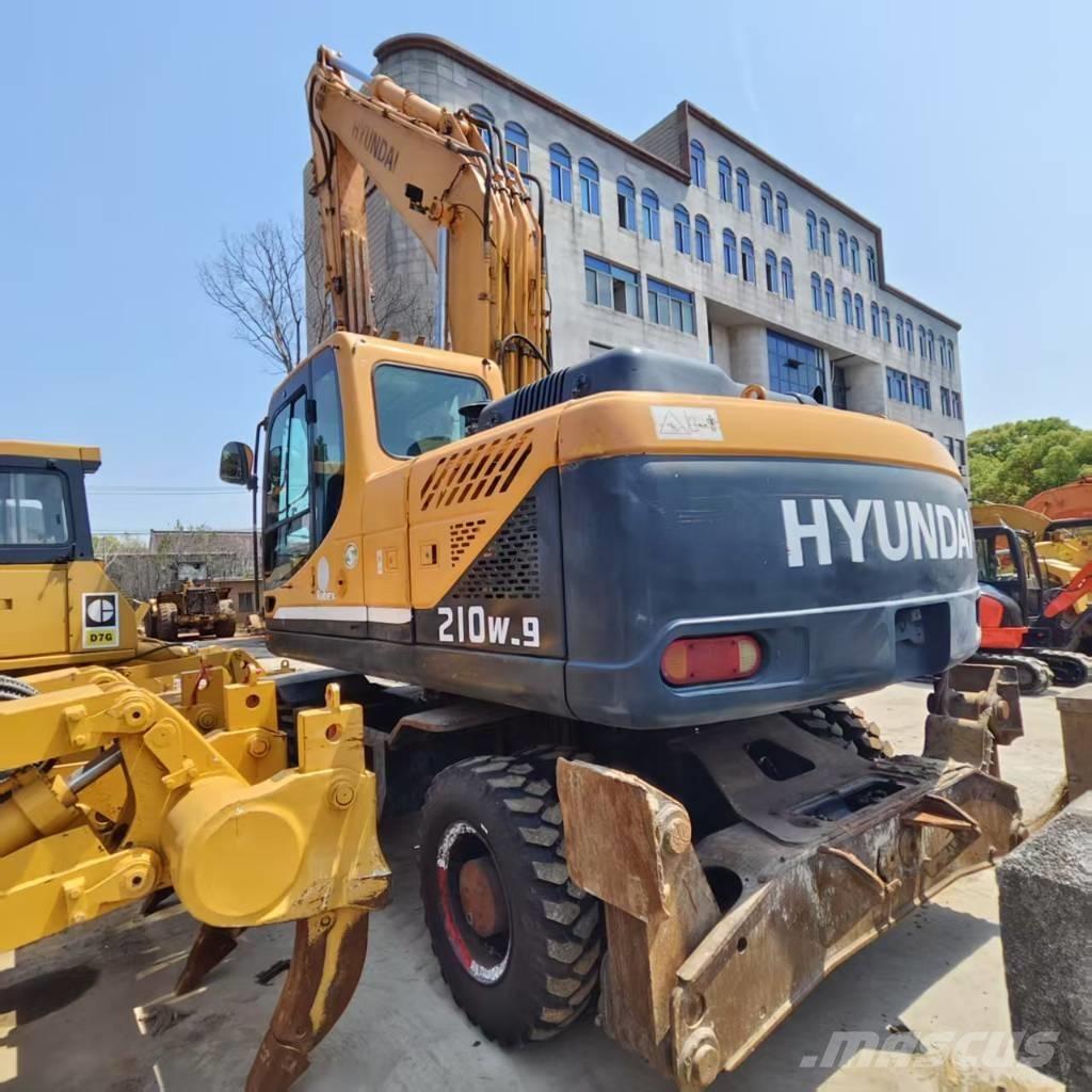 Hyundai R210W-9 حفارات بعجل