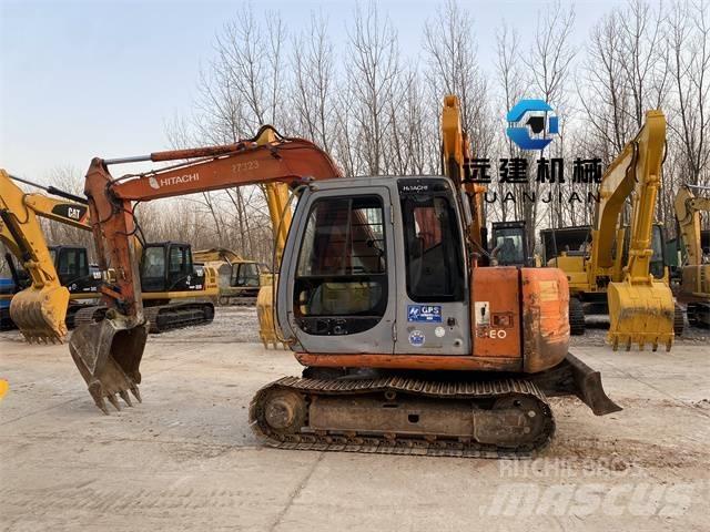 Hitachi EX 60-5 حفارات زحافة