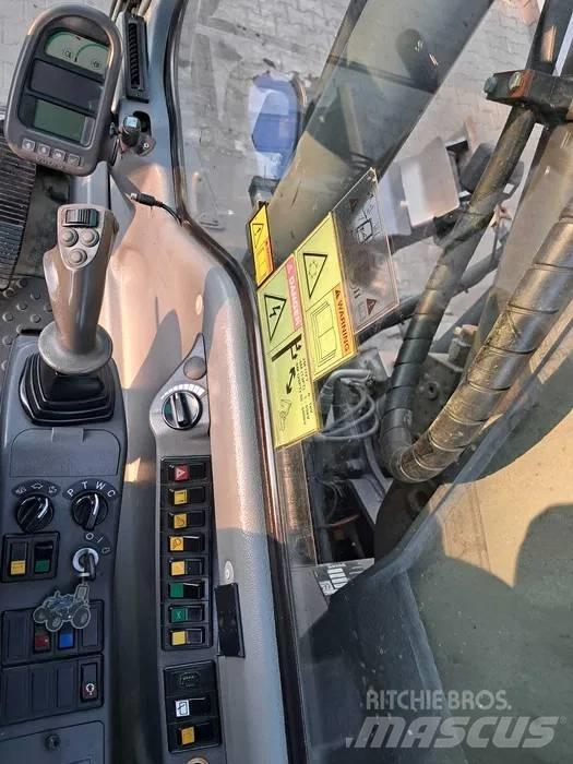 Volvo EW 140 B حفارات بعجل
