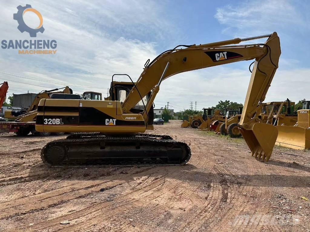CAT 320BL حفارات زحافة