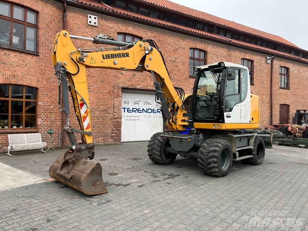 Liebherr A 910 Comp حفارات بعجل
