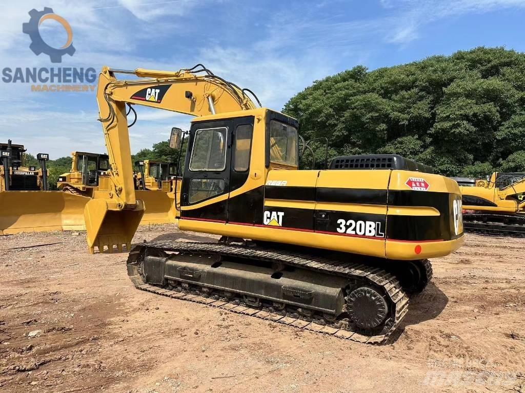 CAT 320 B حفارات زحافة