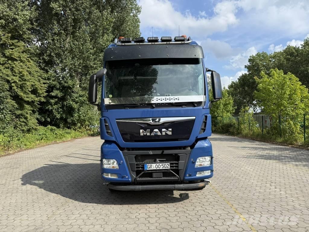 MAN TGX 33.500 شاحنات نقل آلة الغابات