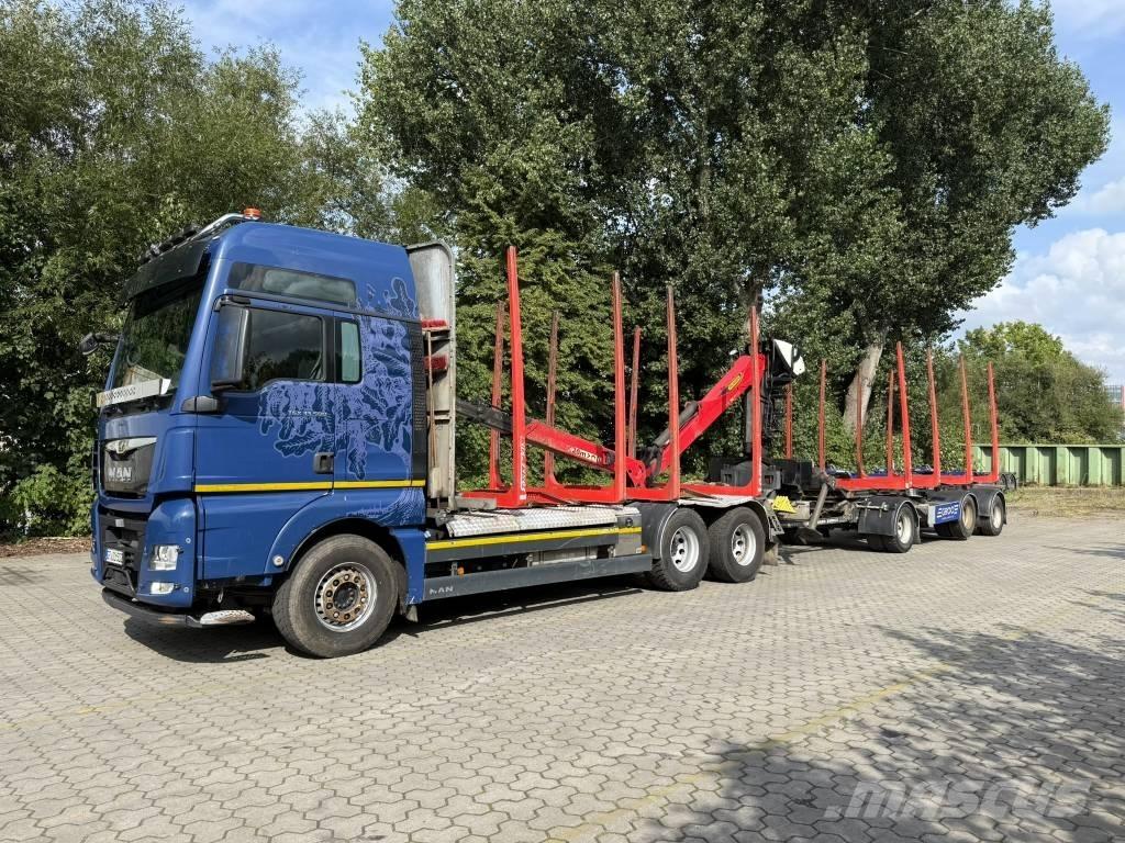 MAN TGX 33.500 شاحنات نقل آلة الغابات