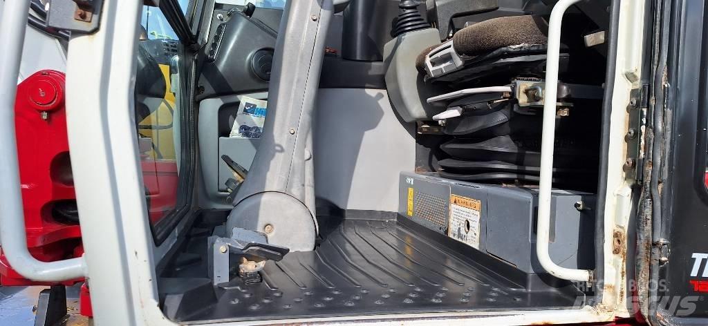 Takeuchi TB 295 W حفارات بعجل
