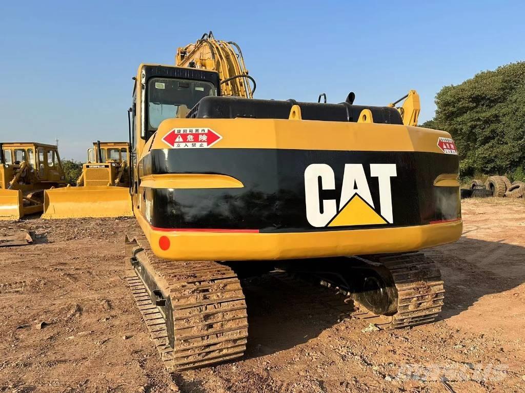 CAT 320 B حفارات زحافة