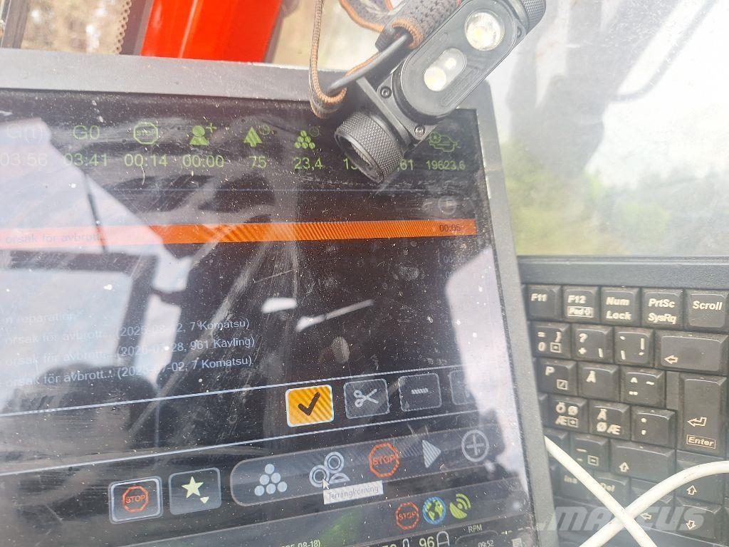 Komatsu 911 حصادات