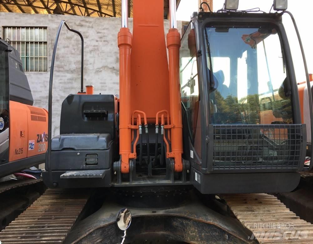 Hitachi zx210 حفارات زحافة