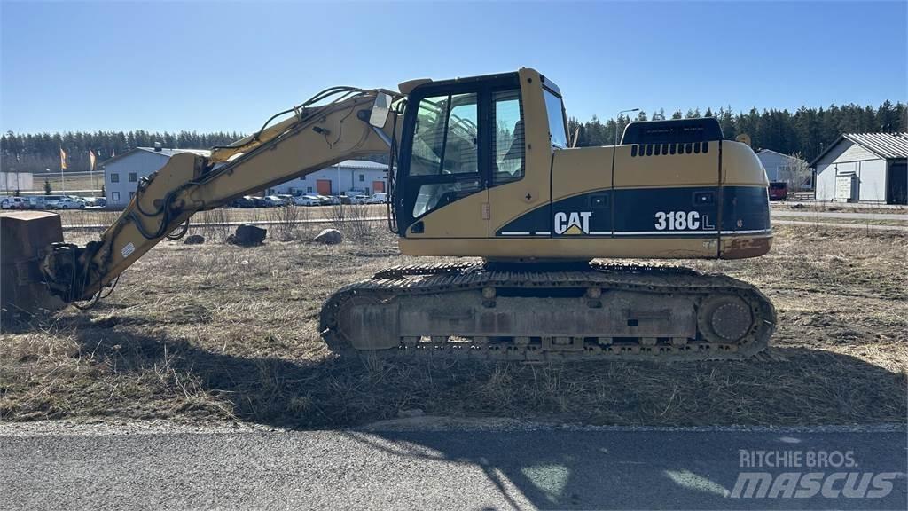 CAT 318 C حفارات زحافة