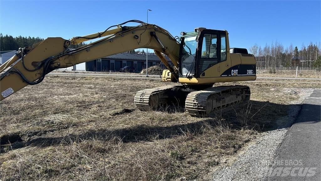 CAT 318 C حفارات زحافة