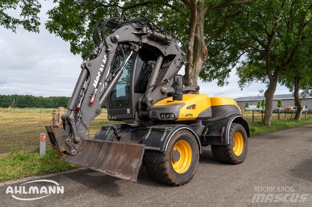 Mecalac 12 MTX حفارات بعجل