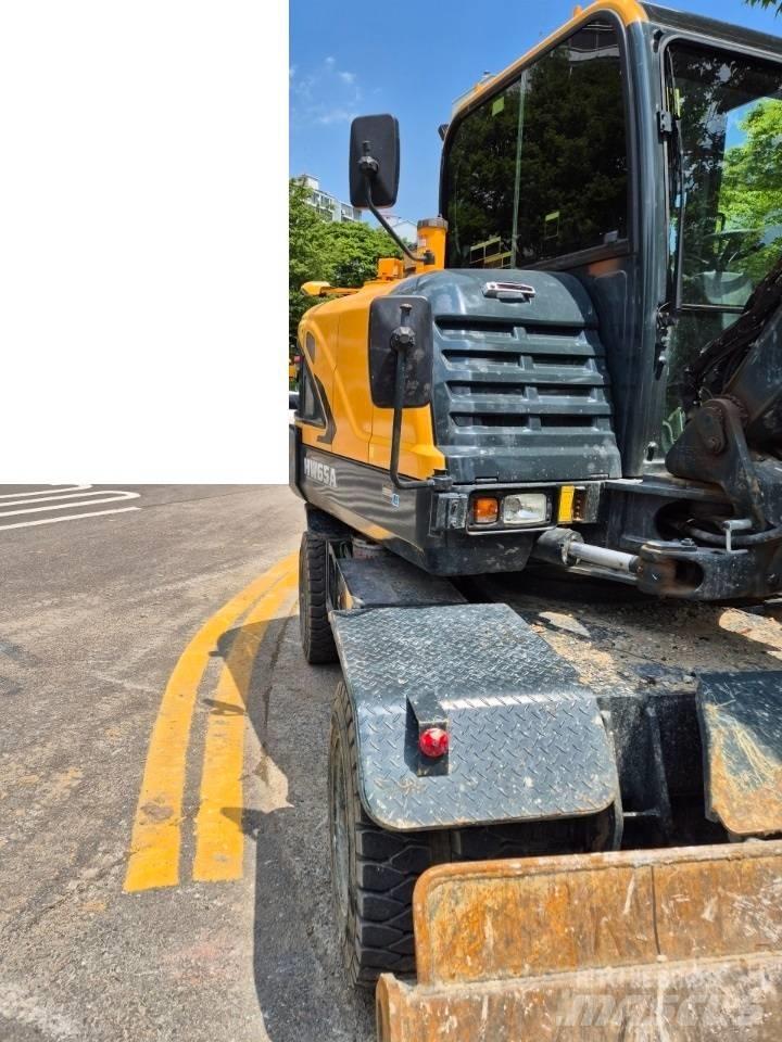 Hyundai 65A حفارات بعجل