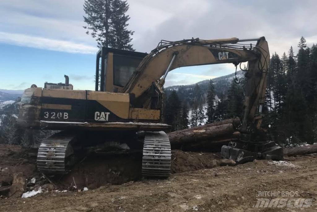 CAT 320 B حفارات زحافة