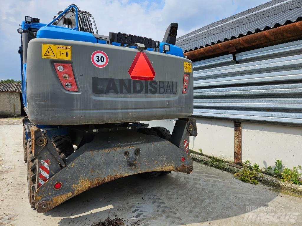 Volvo EW 180 D حفارات بعجل