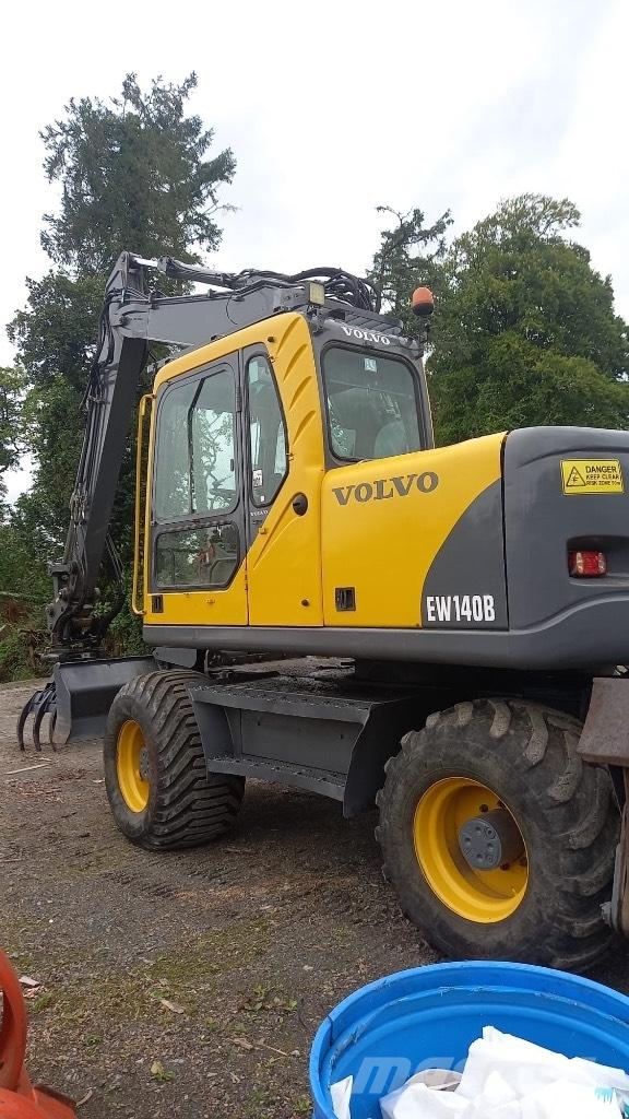 Volvo EW 140 B حفارات بعجل