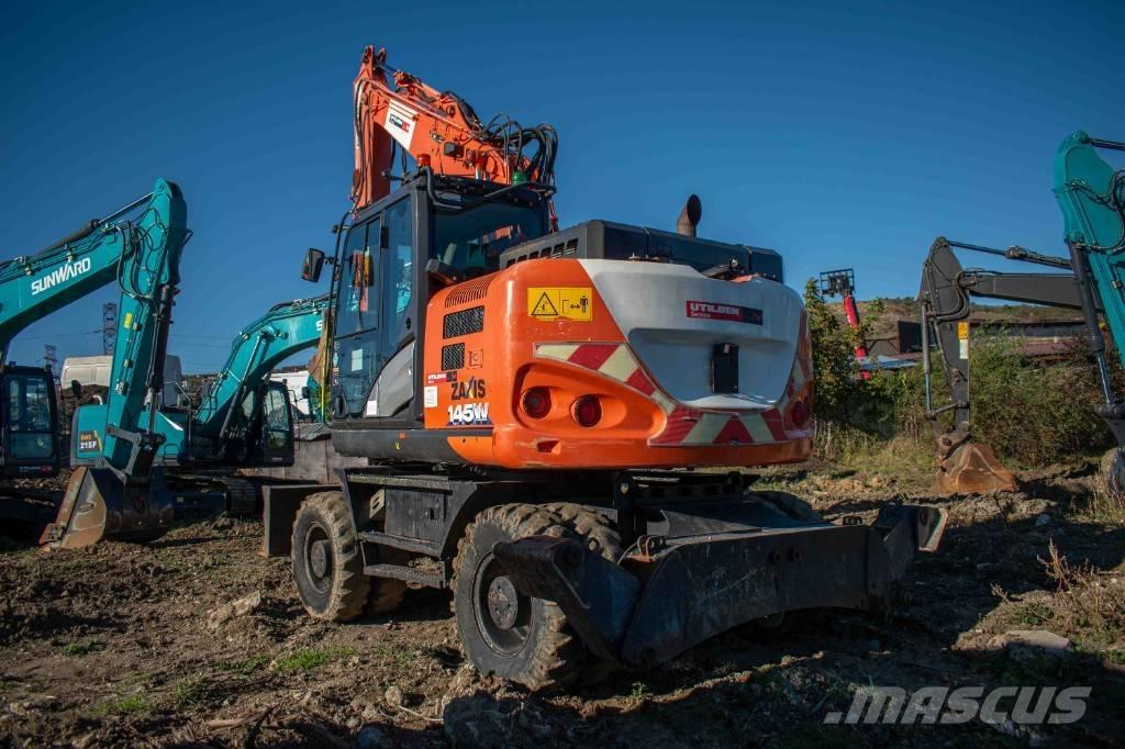  Hitach ZX 145 حفارات بعجل